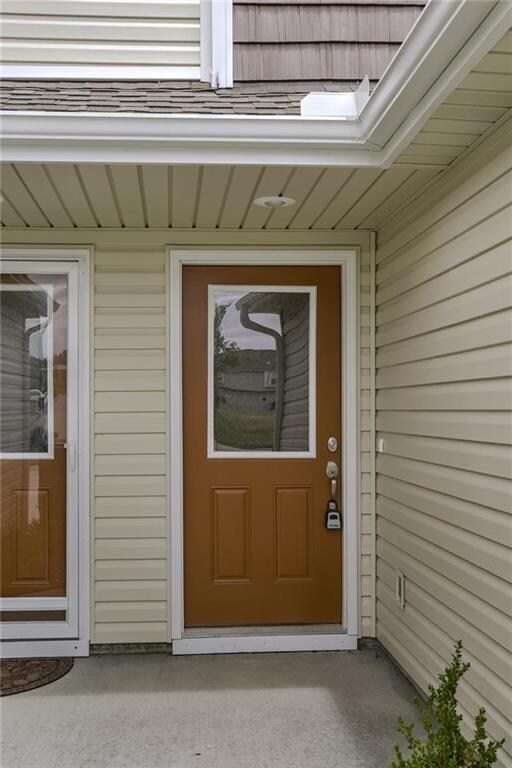 235 Pointe Ln, Raymore, MO 64083 - photo 3