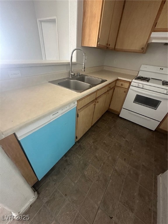 Kitchen featuring stove, range hood, light counter