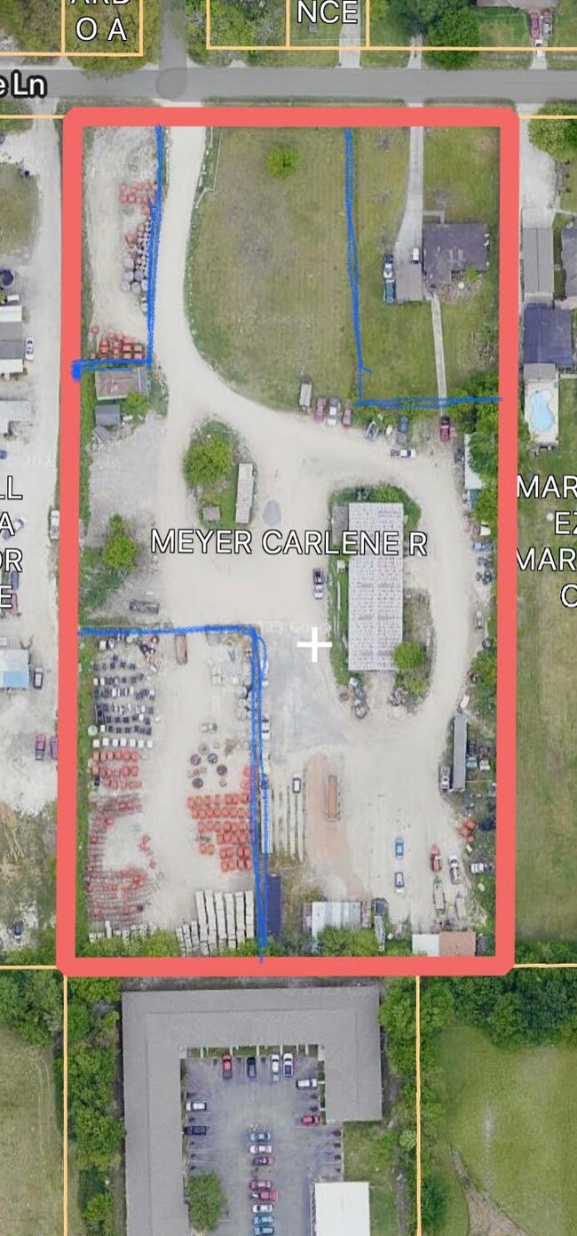 This is an older photo, Red line is boundary blue lines are interior fences.