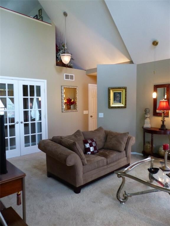 Unique vaulted ceiling in living room and dining r