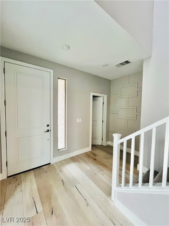 Foyer entrance featuring light wood-type flooring