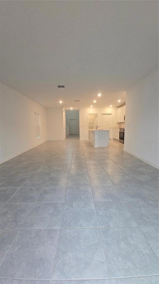 4253 Twisted Twig Bend, Kissimmee, FL 34746 - photo 7