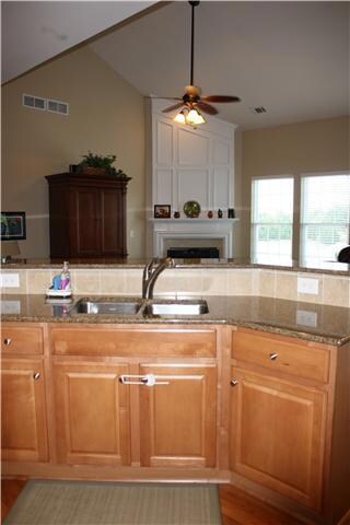 Granite counters with tile backsplash