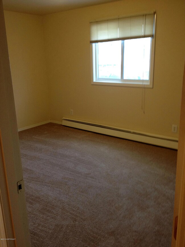 E 4th listing bedroom 1
