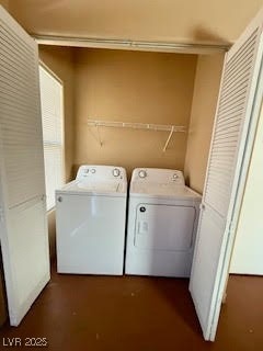 Laundry area featuring separate washer and dryer a
