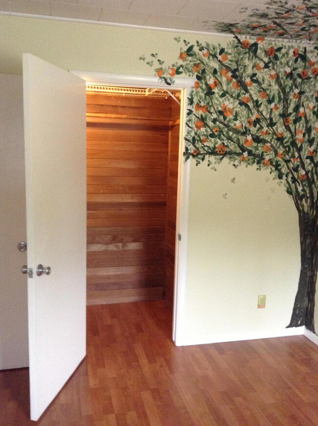 Bedroom 1 w/laminate flrs & cedar closet