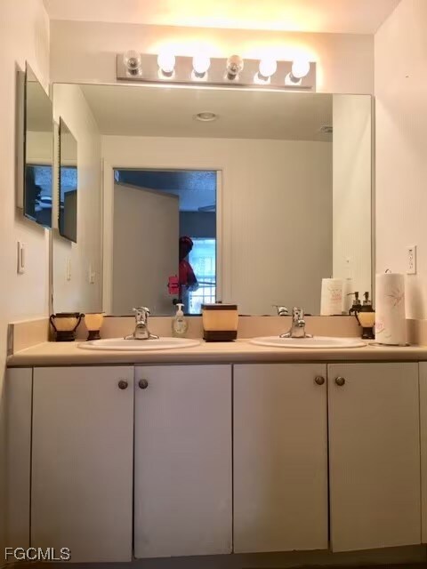 Bathroom featuring double vanity