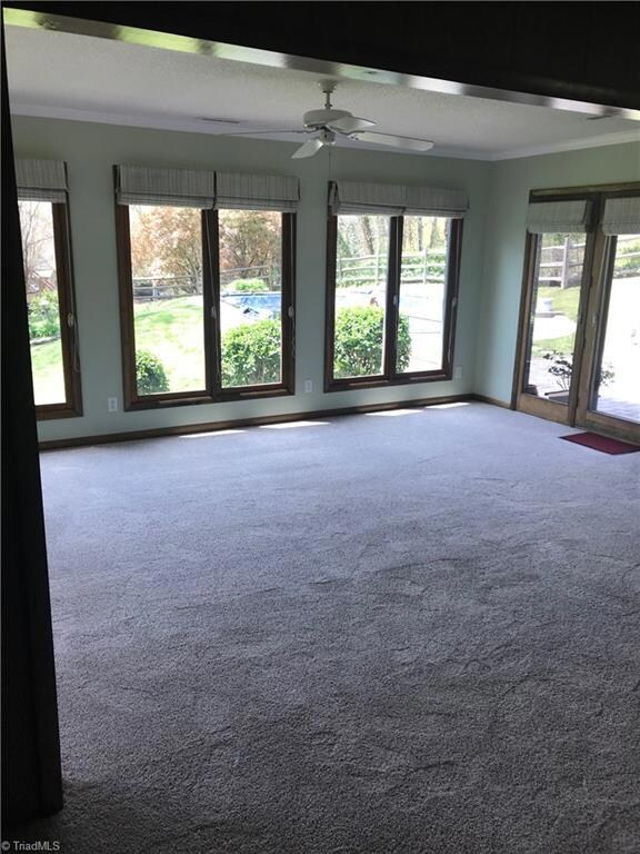 View of the Sunroom from the Kitchen/Greatroom Area.
