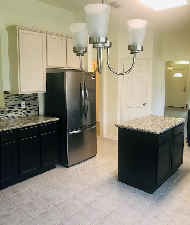 Stainless refrigerator and workable island