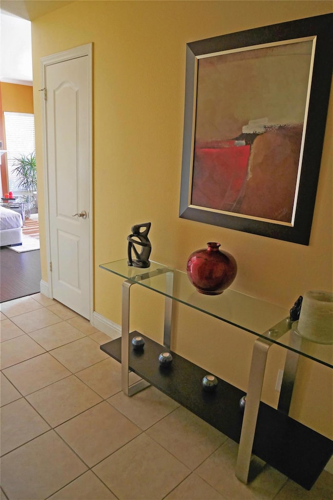 Home office featuring tile patterned flooring and