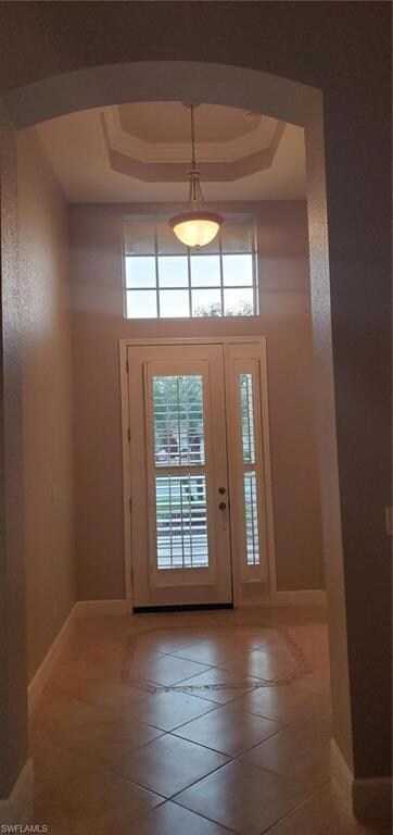 Foyer with Tray Crown Molding, and Volume ceiling