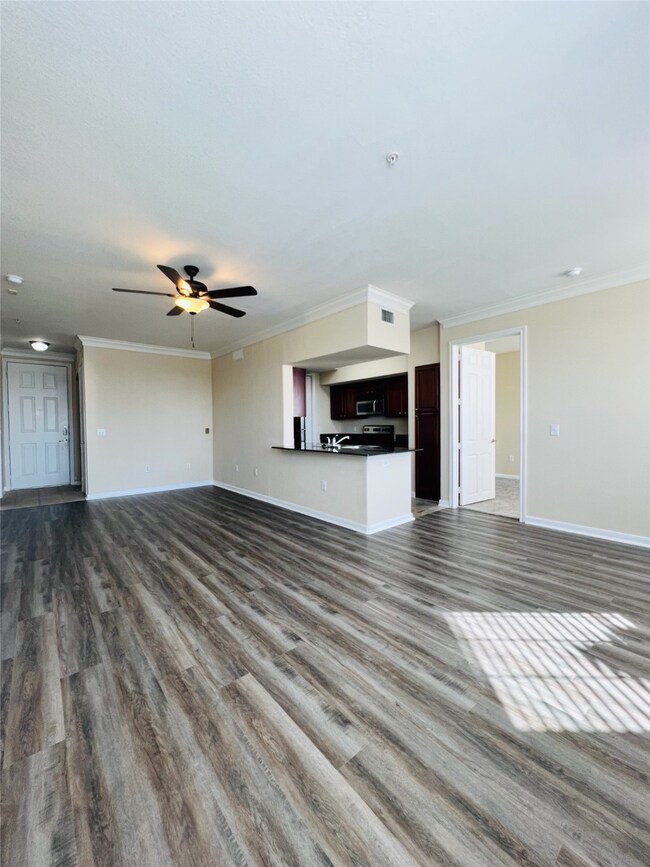 The spacious living, kitchen and dining area is open