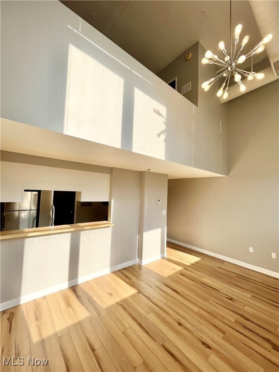 Living room with brick wall and light wood finished​​‌​​​​‌​​‌‌​​​‌​​‌‌​​‌‌​‌​​​‌‌​​‌​​​​​‌ floors