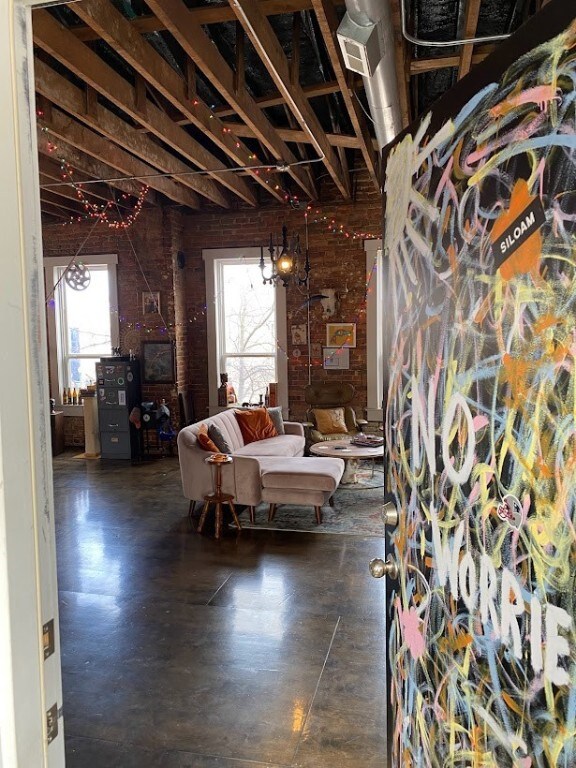 Natural light floods into the loft from the west a