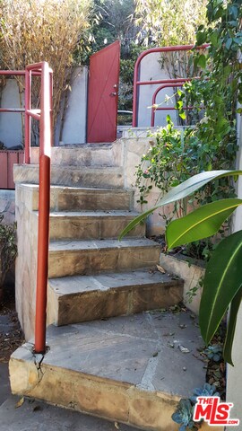 Front gate stairs down to house