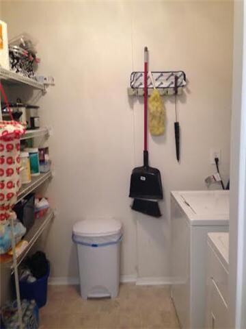 Laundry off kitchen is a great size with pantry space.