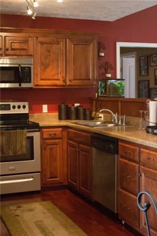 Kitchen has stainless steel appliances