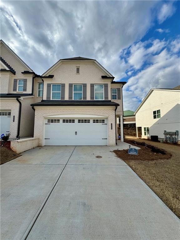 View of front of home with a garage