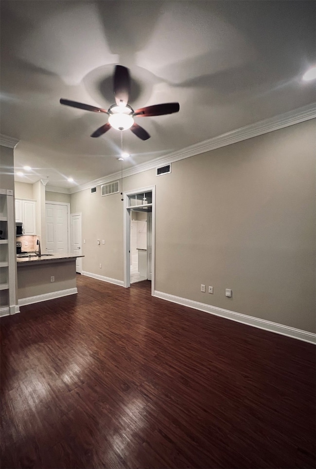 Living room: 12'6X15'6 with built-in bookcase.