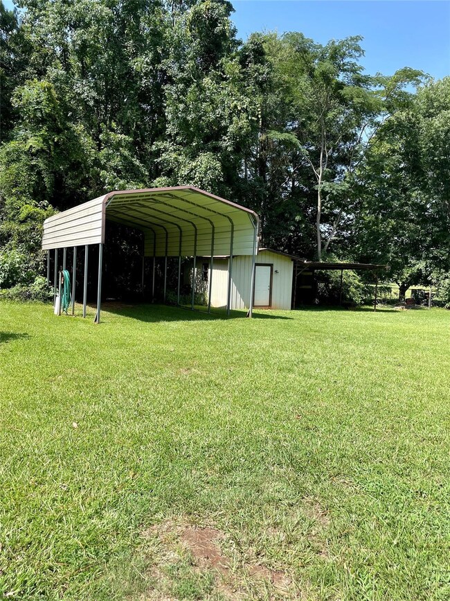 Shop and covered RV parking