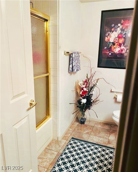 Tub/shower combo with marble stone flooring