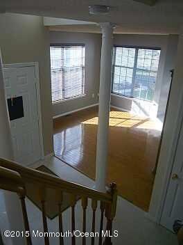 front door and dining room