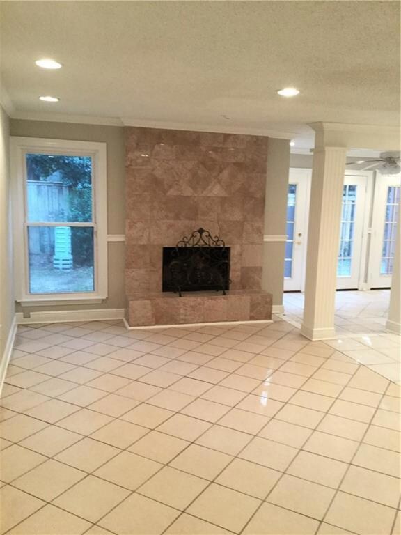 Another view of living room, with cermic flooring,