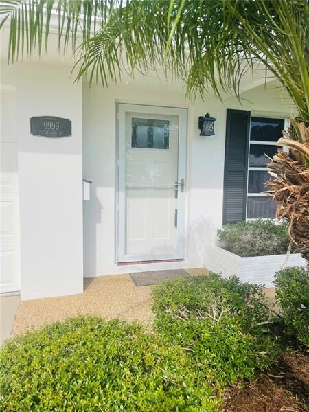 Brand new solid front door with window.  And newer
