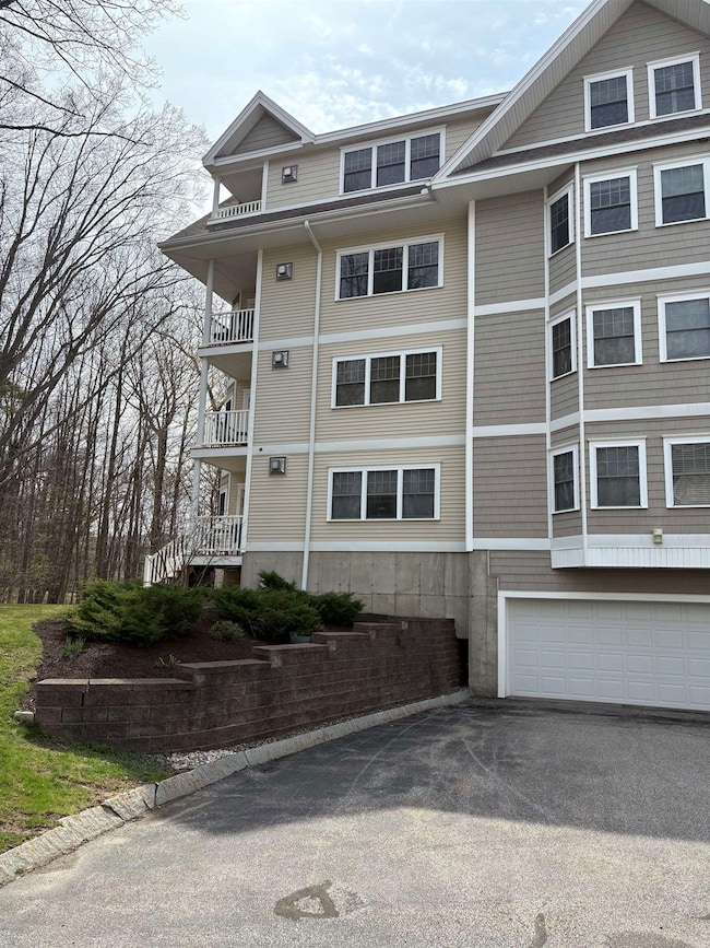 Corner unit rear of building looking at tops of trees!
