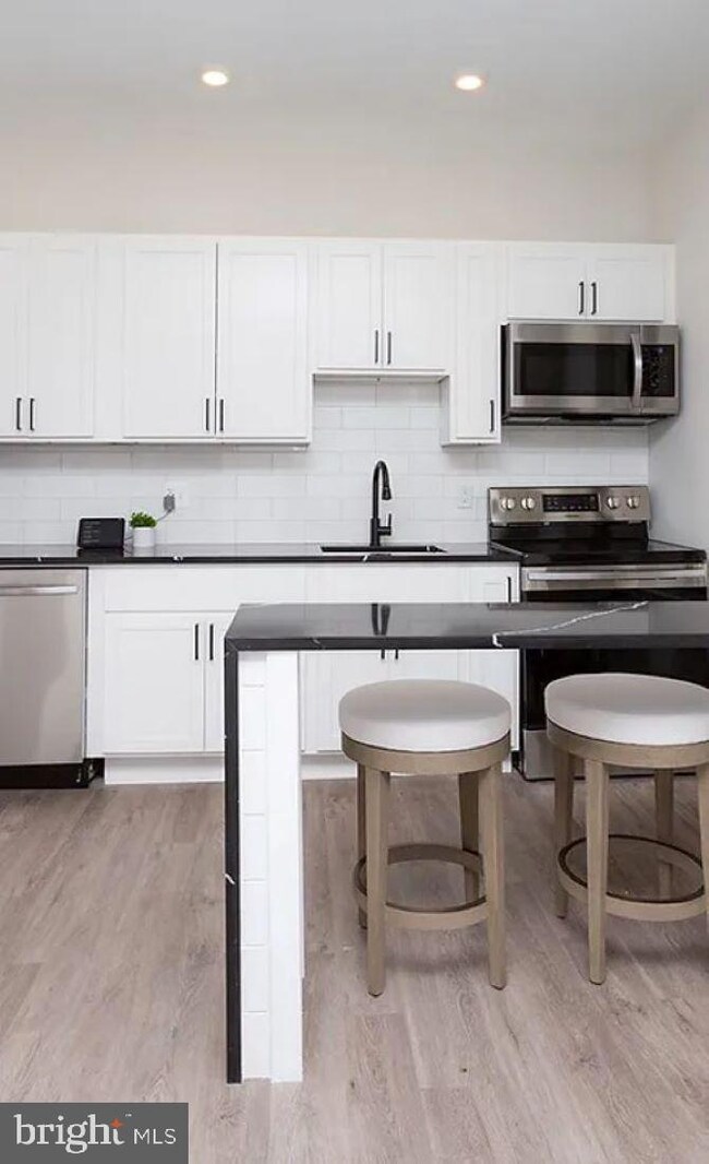 1210 N Calvert St unit 2A, Baltimore, MD 21202 - photo 3