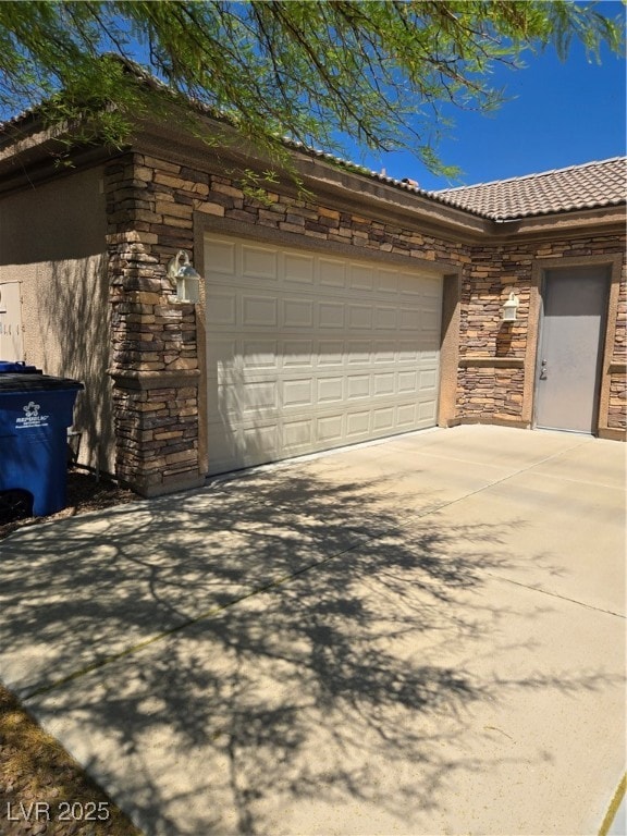 Driveway view of 2-car garage.