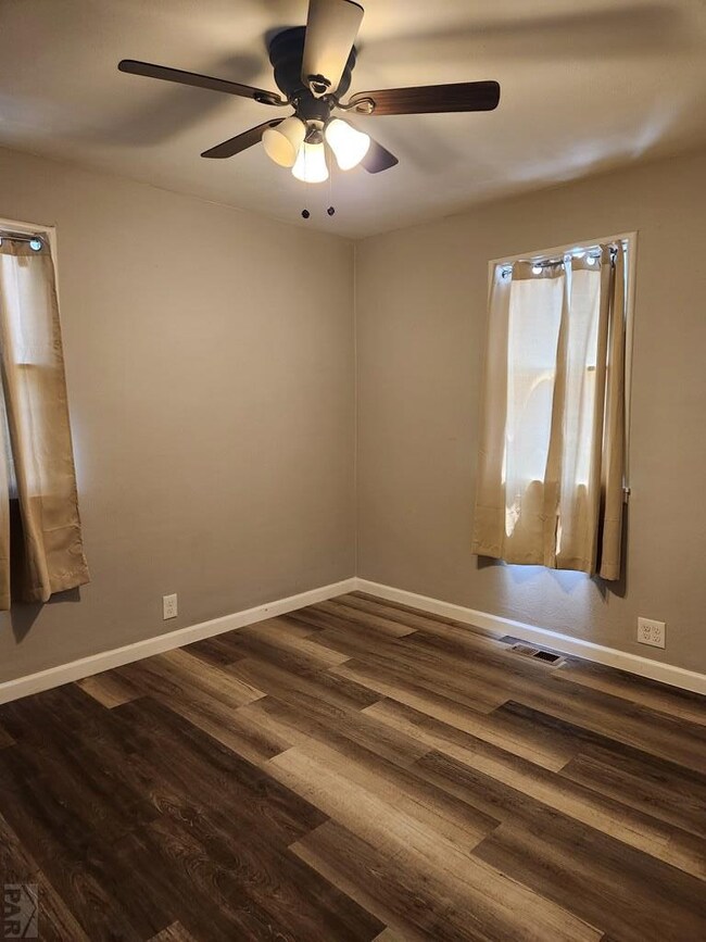 Bedroom . a fan here too but cross ventilation