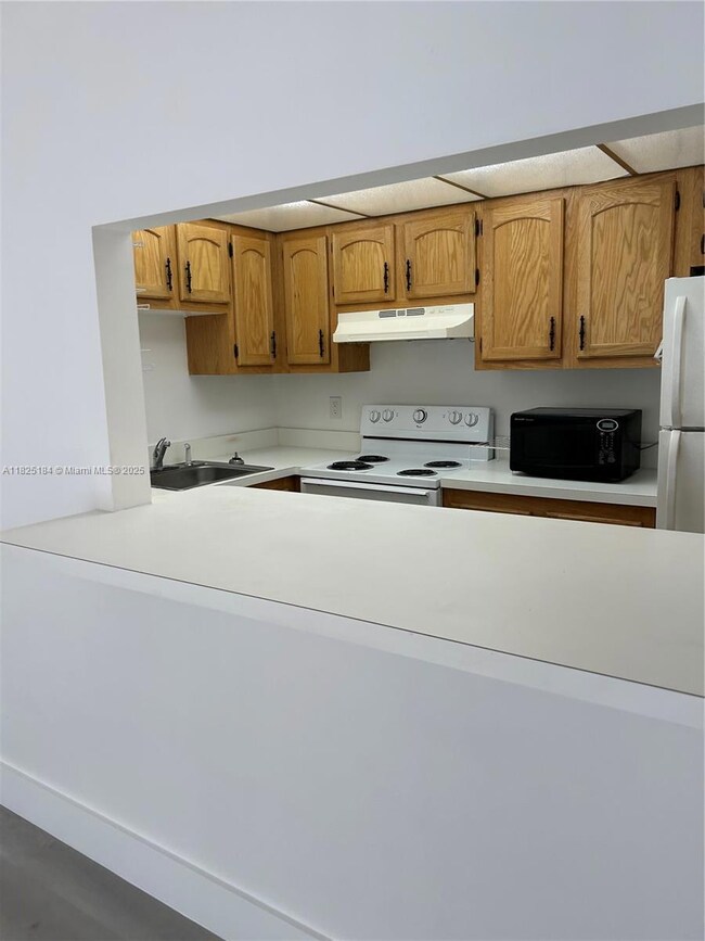 4154 Inverrary Dr unit 205, Lauderhill, FL 33319 - photo 6