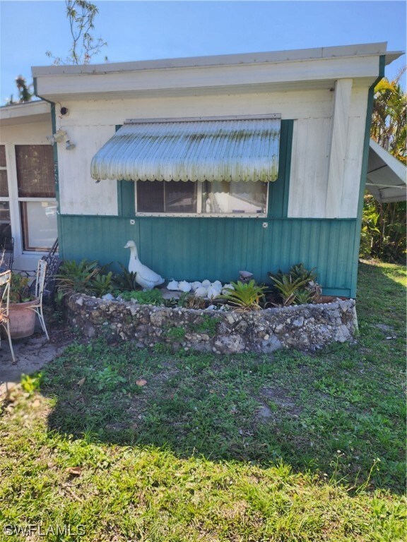 5449 Rainbow Dr, Bokeelia, FL 33922 - photo 2