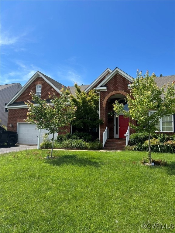 View of front of home featuring brick siding and a