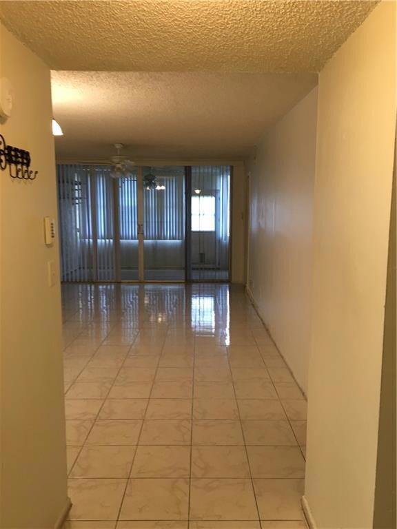 VIEW INTO LIVING ROOM FROM FRONT DOOR