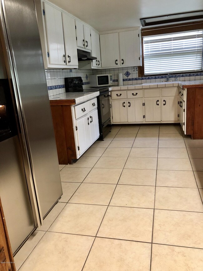 407 Beauregard Ave NE, Palm Bay, FL 32907 - photo 5