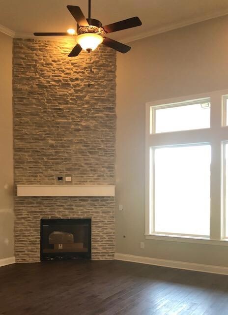 Cozy fireplace with floor to ceiling stone