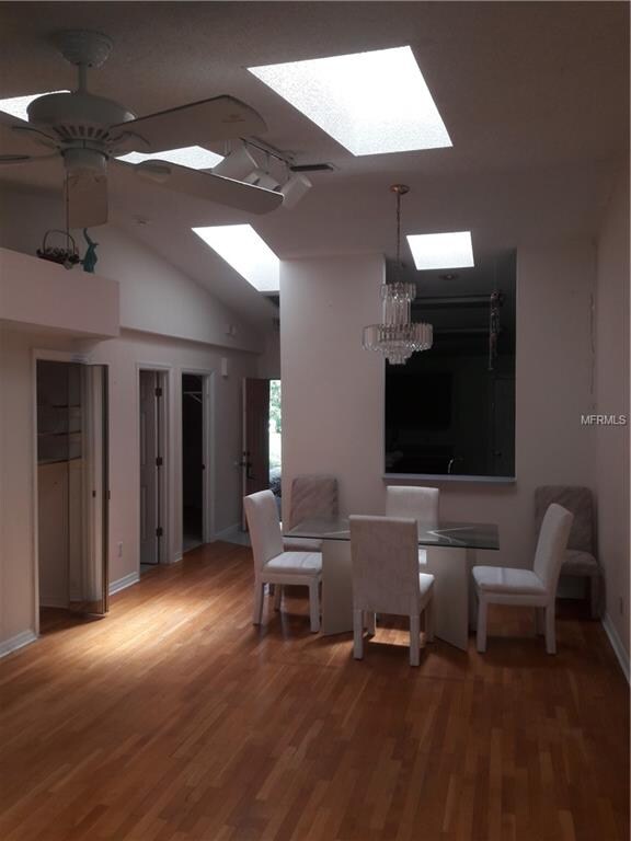 From great room toward open front door, dining roo