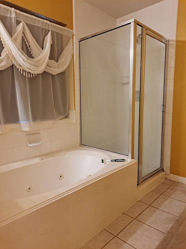 Master bath with garden tub and separate shower