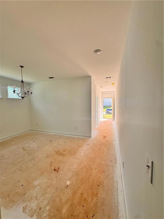 Spare room with a chandelier
