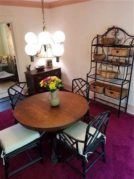 THIS CHARMING DINING ROOM LENDS ITSELF TO LARGE DI