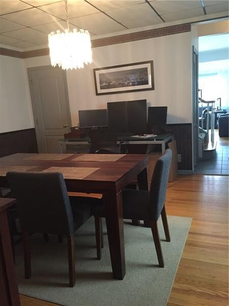 Dining room with furniture.