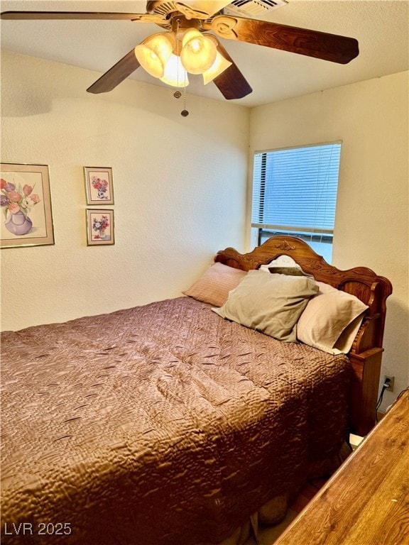 Bedroom with a ceiling fan