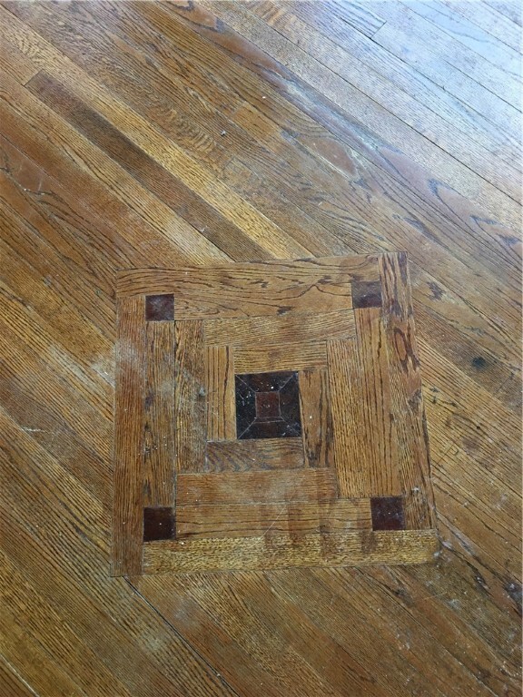 Hardwood floors have 5 inlays as noted...re-sand a