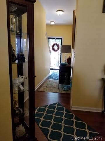 Large Entry Way with Storage Space Under Stairwell