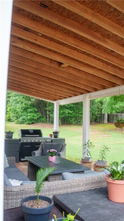 View of patio / terrace with an outdoor hangout area and grilling area
