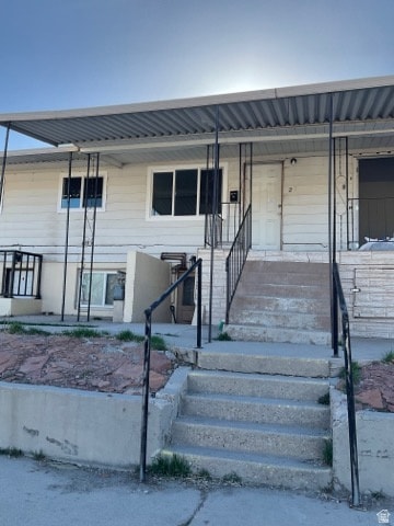 View of front of home with covered porch