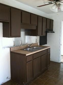 New kitchen cabinets, new tile and new ceiling fan.  