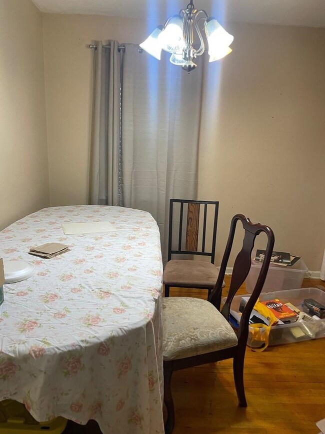 Bedroom featuring wood-type flooring